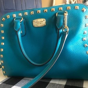 - Michael Kors leather Pebbled handbag